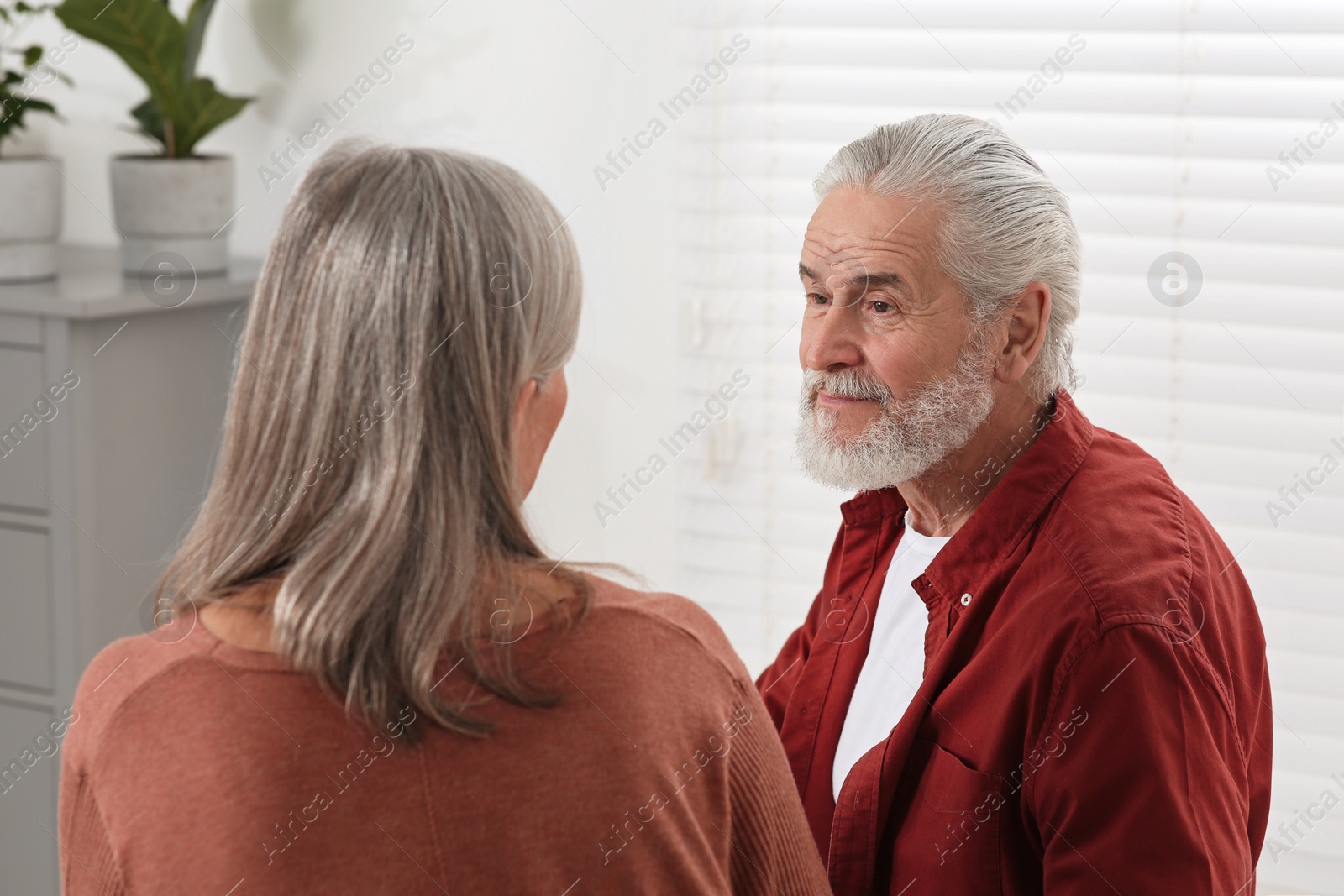 Photo of Senior couple spending time together at home