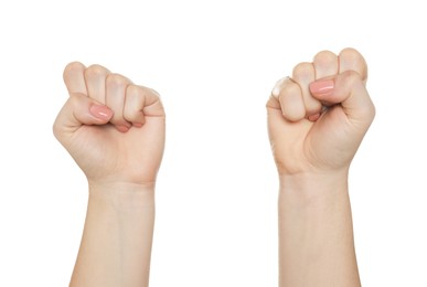 Freedom concept. Woman showing fists on white background, closeup
