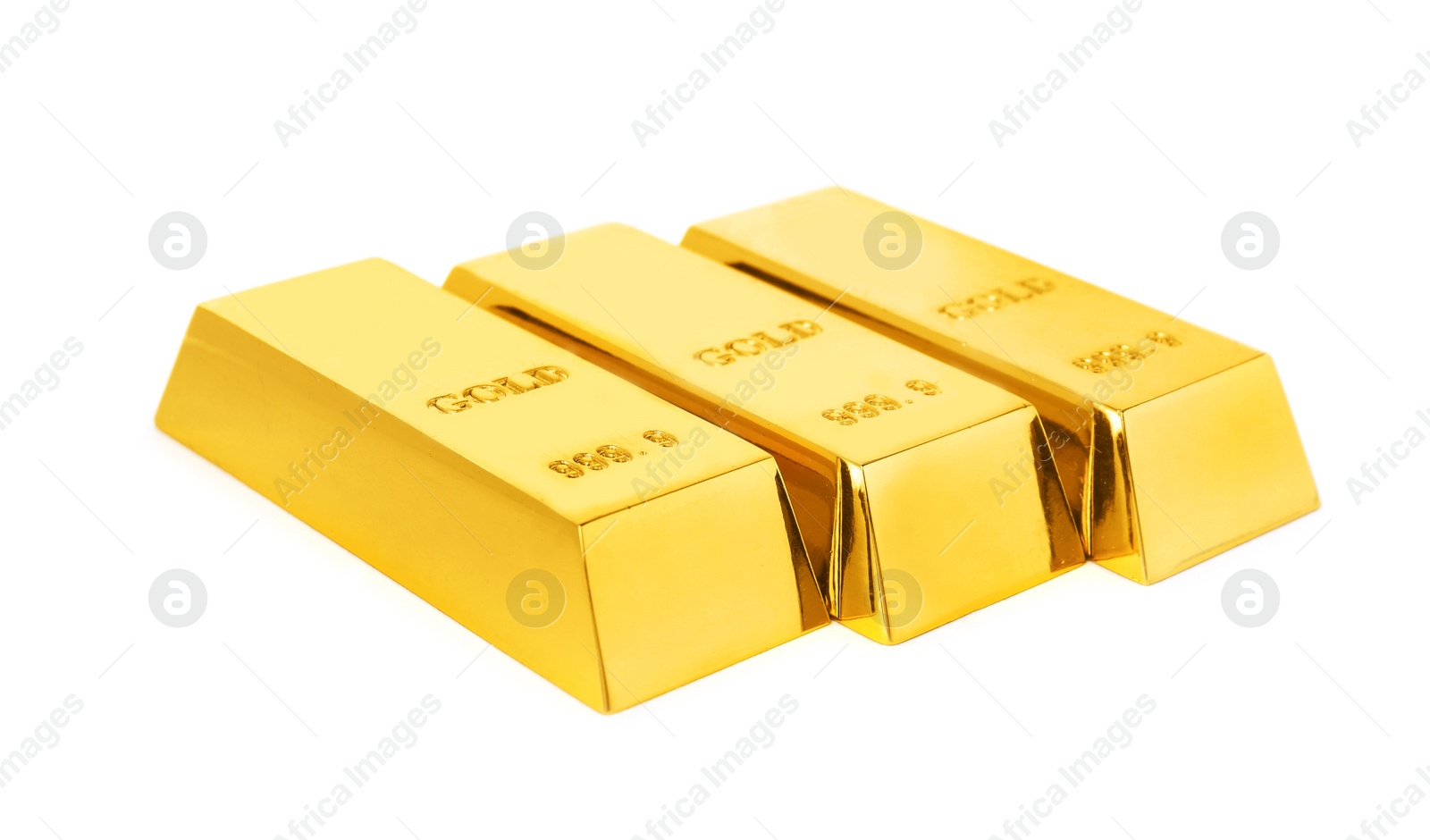 Photo of Precious shiny gold bars on white background