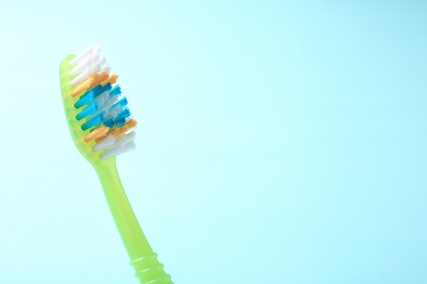 Photo of Manual toothbrush on color background. Dental care