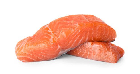 Photo of Pieces of fresh raw salmon isolated on white