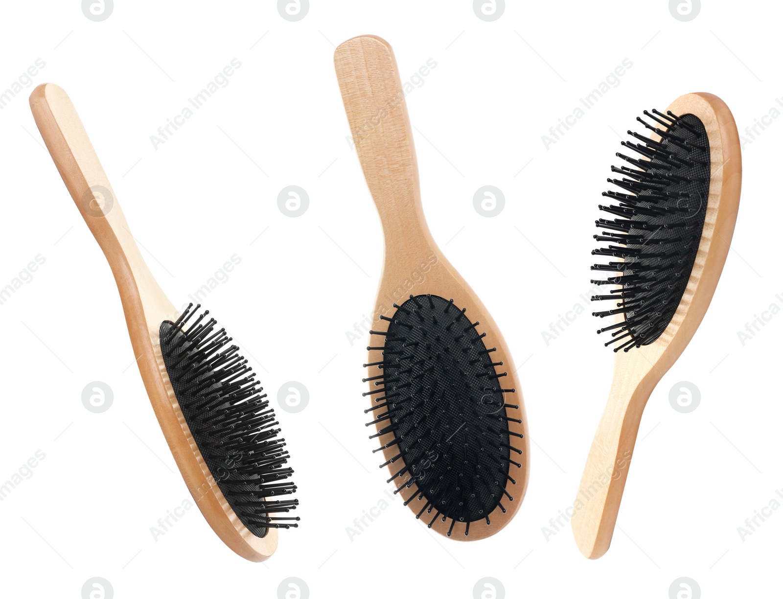 Image of Set with wooden hair brushes on white background