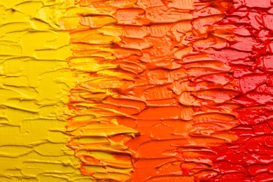 Strokes of colorful oil paints as background, closeup