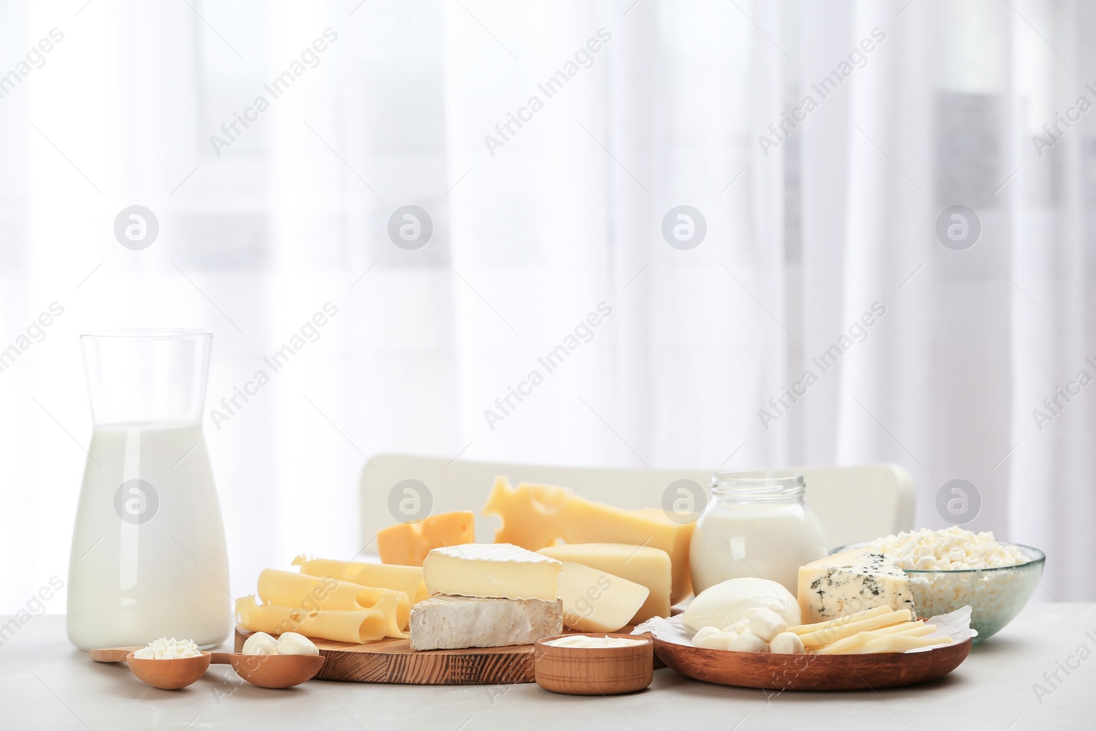 Photo of Different dairy products on table