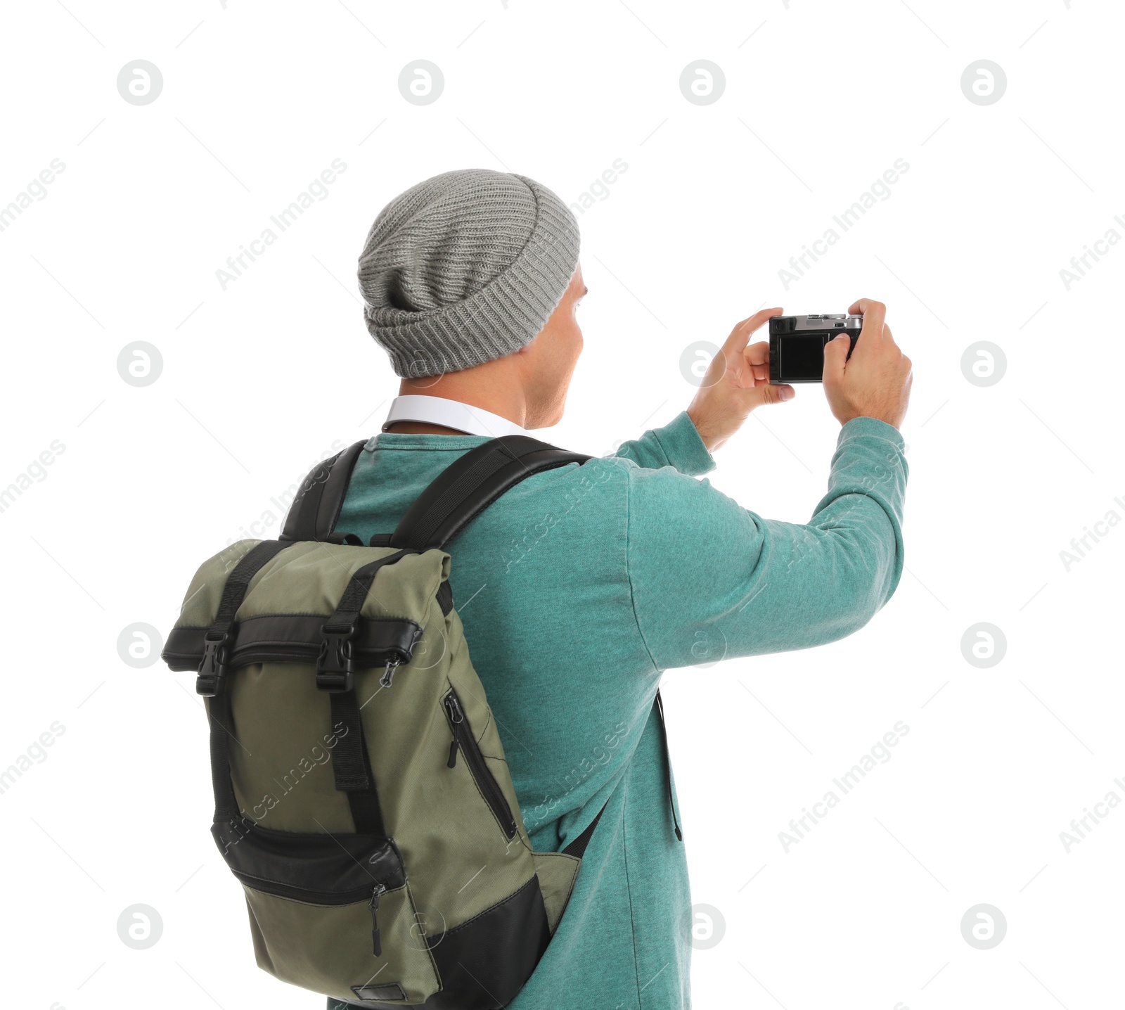 Photo of Man with backpack taking picture on white background. Autumn travel