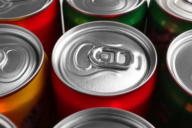 Photo of Energy drinks in cans, closeup. Functional beverage