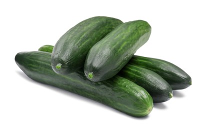 Photo of Many long fresh cucumbers isolated on white