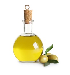 Glass bottle with fresh olive oil on white background