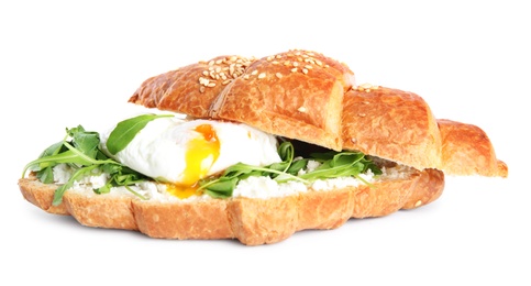 Photo of Delicious croissant with arugula and egg isolated on white