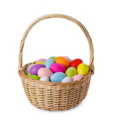 Wicker basket with beautifully painted Easter eggs isolated on white