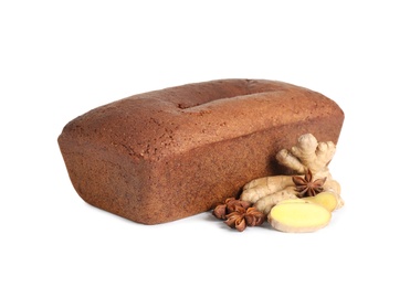 Photo of Delicious gingerbread cake, ginger and anise on white background