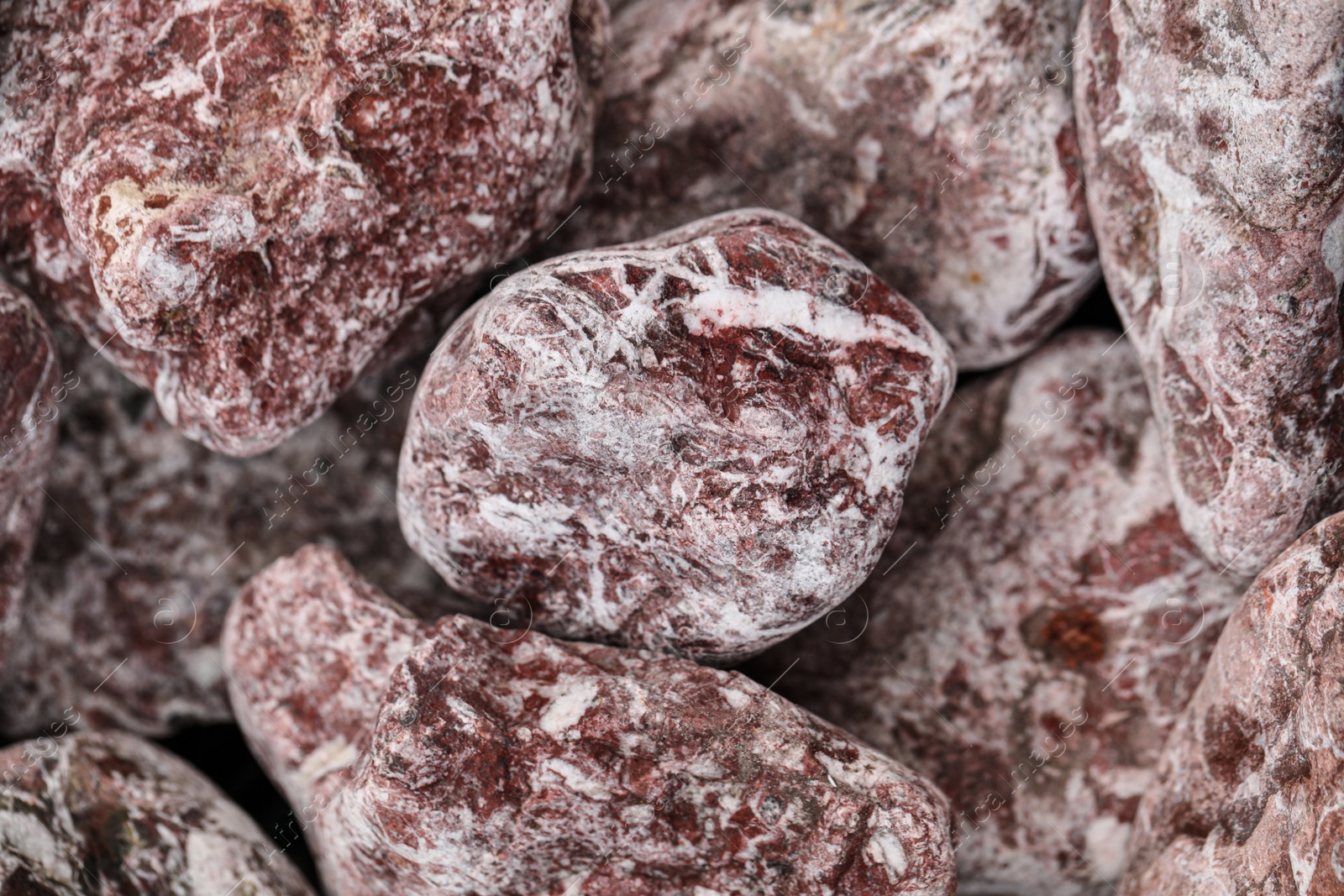 Photo of Many beautiful stones as background, closeup view