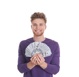 Happy young man with money on white background