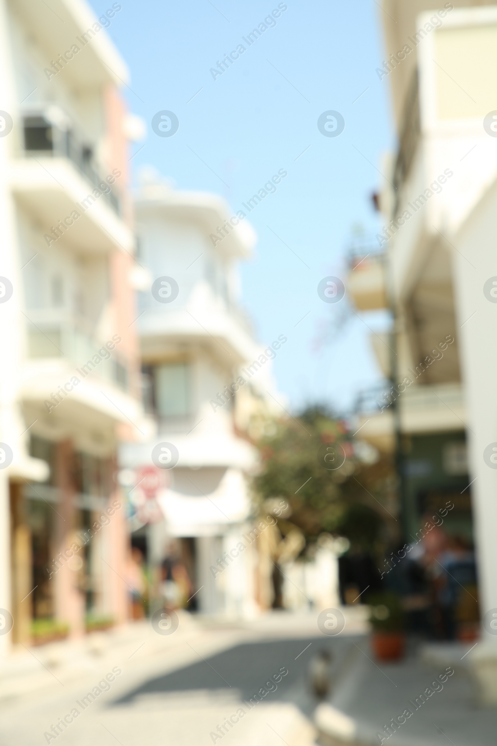 Photo of Blurred view of city street on sunny day