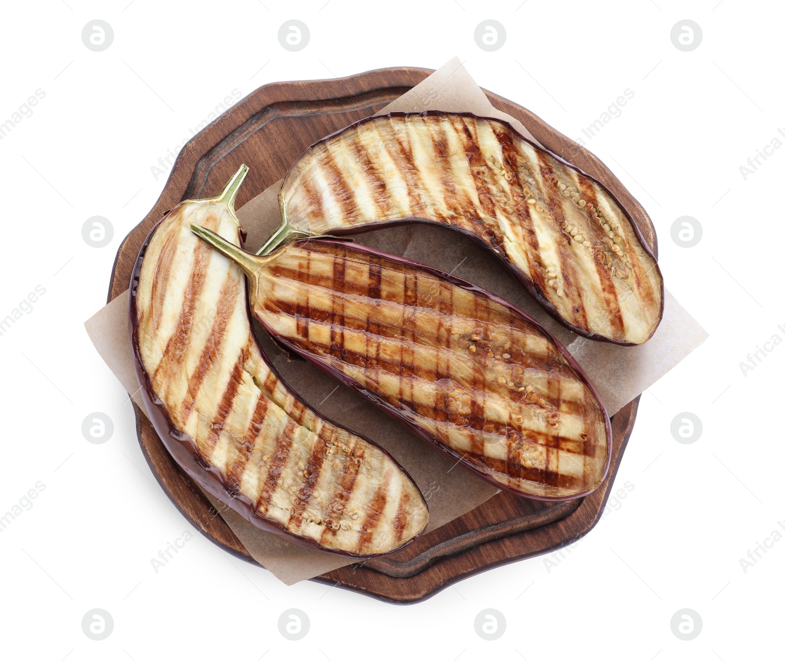 Photo of Serving board with delicious grilled eggplant halves isolated on white, top view