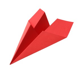 Photo of Handmade red paper plane isolated on white