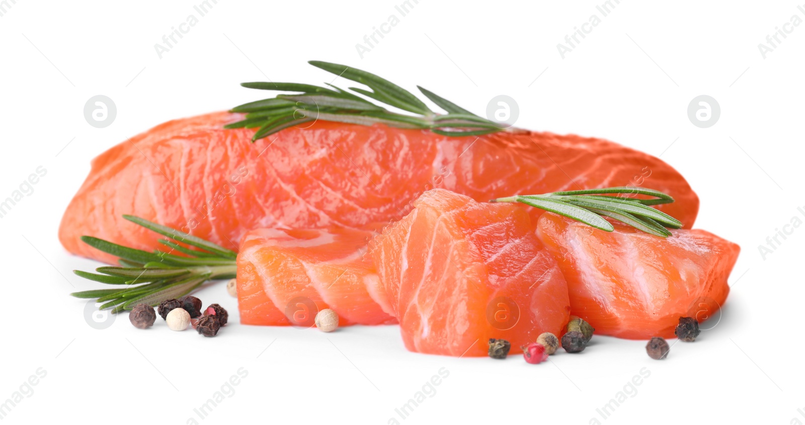 Photo of Pieces of fresh raw salmon and spices on white background