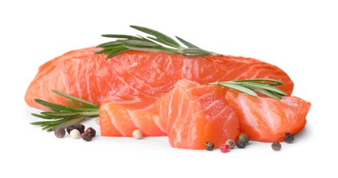 Photo of Pieces of fresh raw salmon and spices on white background