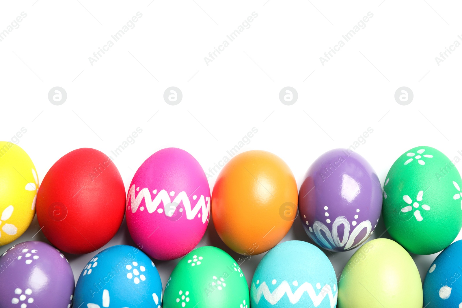 Photo of Colorful Easter eggs with different patterns isolated on white, top view