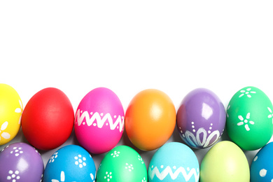 Photo of Colorful Easter eggs with different patterns isolated on white, top view