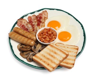 Photo of Plate with fried eggs, sausages, mushrooms, beans, bacon and toasts isolated on white. Traditional English breakfast