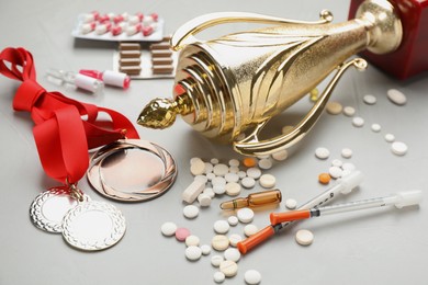 Photo of Composition with drugs on light grey table. Doping control