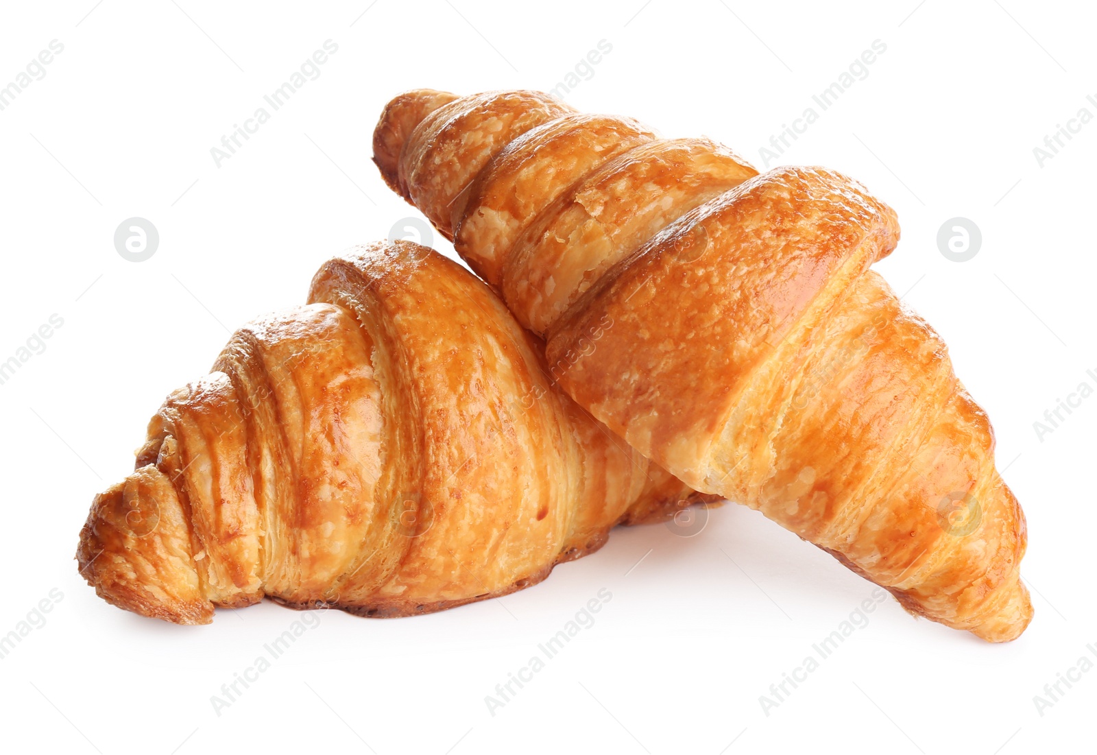 Photo of Fresh tasty croissants on white background. French pastry