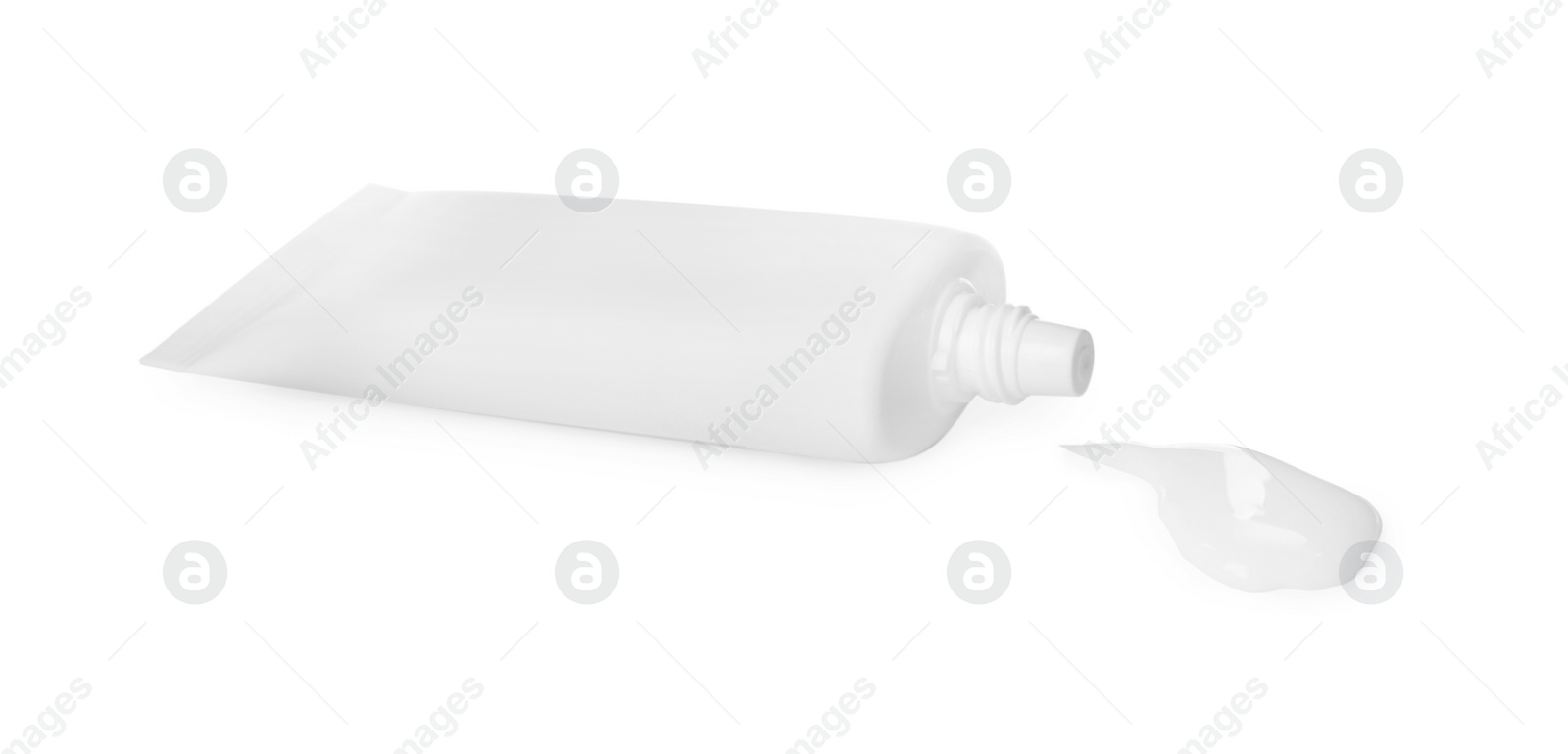 Photo of Tube with squeezed hand cream on white background