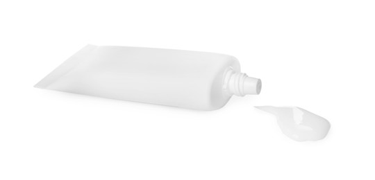 Photo of Tube with squeezed hand cream on white background