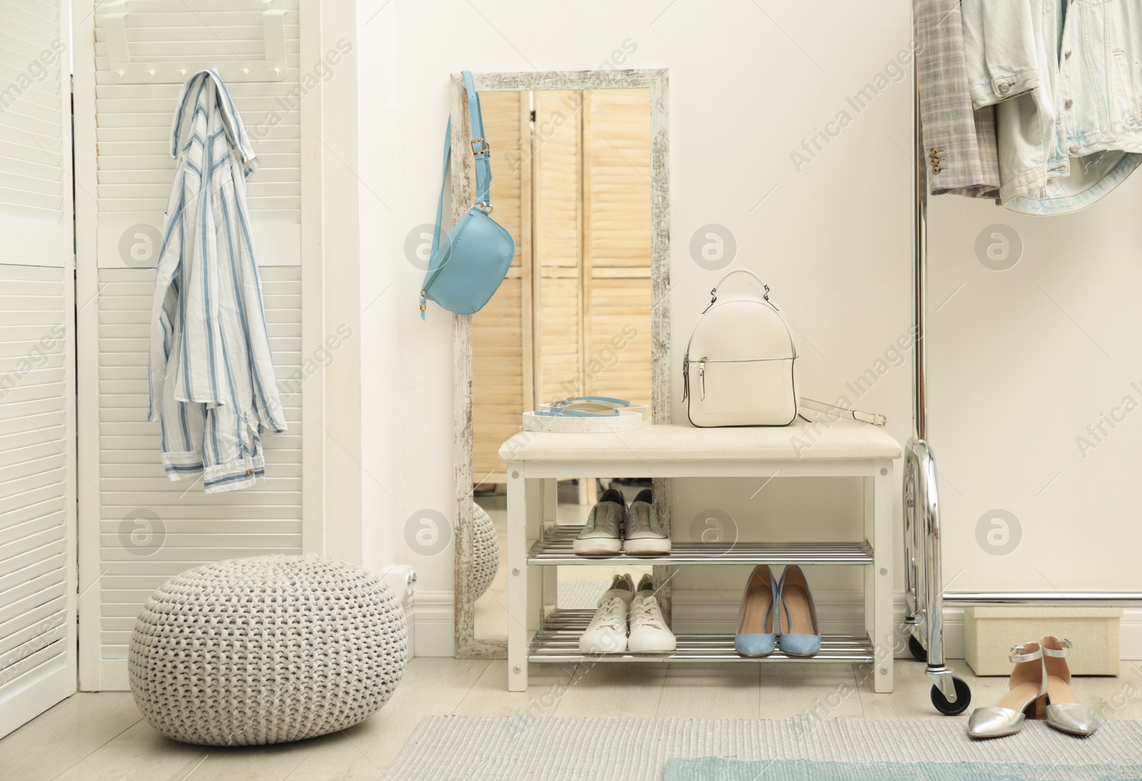 Photo of Cozy hallway interior with storage bench and stylish design elements