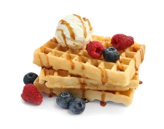 Photo of Tasty Belgian waffles with ice cream, berries and caramel syrup on white background