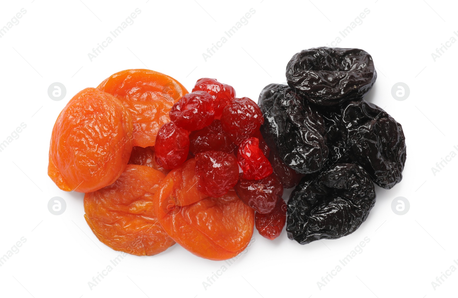 Photo of Mix of delicious dried fruits isolated on white, top view