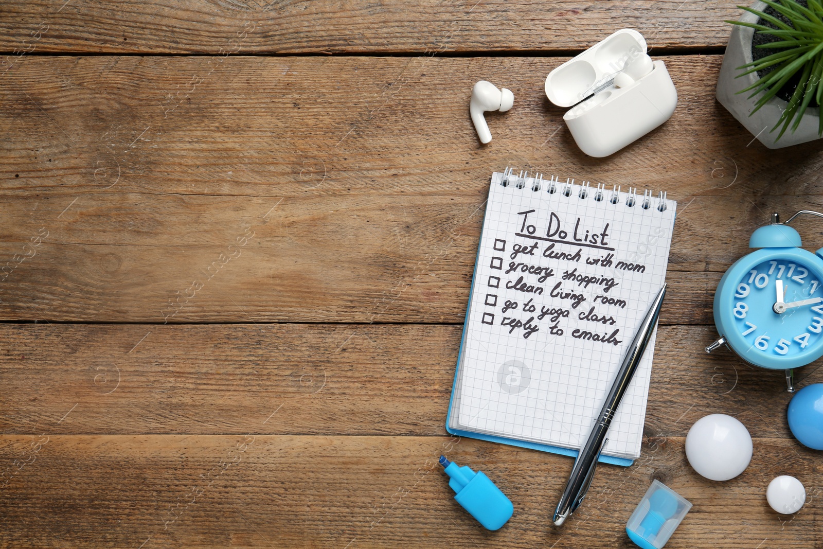 Photo of Flat lay composition with to do list on wooden table, space for text