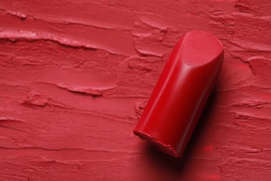 Photo of Beautiful red lipstick and smears, top view