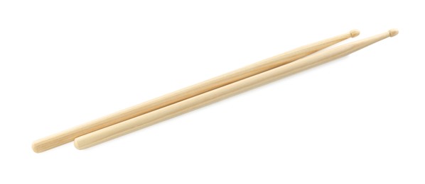 Photo of Drumsticks on white background, top view. Musical instrument