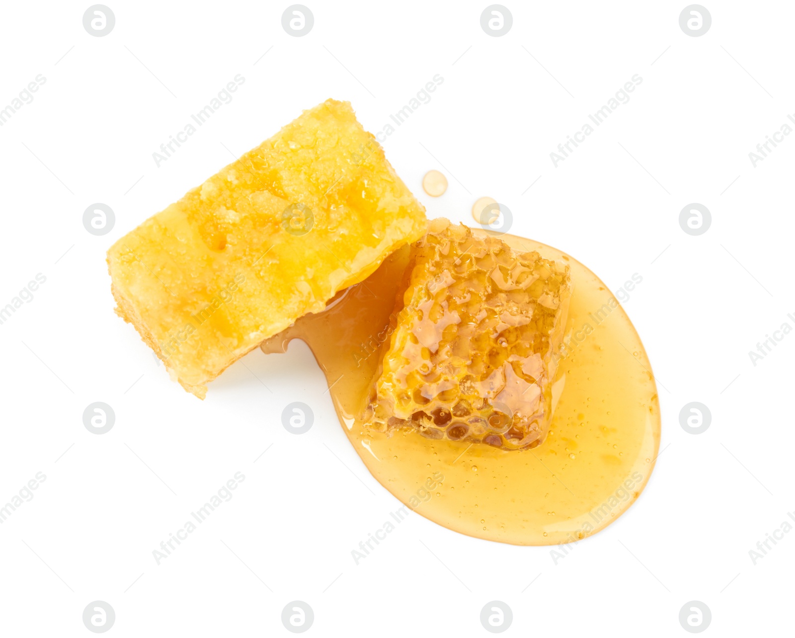 Photo of Pieces of tasty fresh honeycomb isolated on white, top view