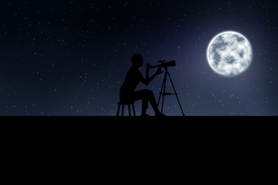 Silhouette of astronomer with telescope outdoors at full moon night
