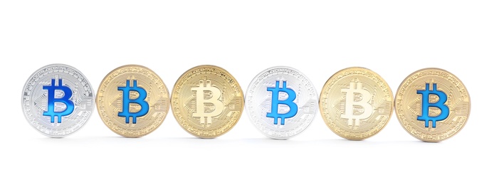 Row of bitcoins isolated on white. Digital currency