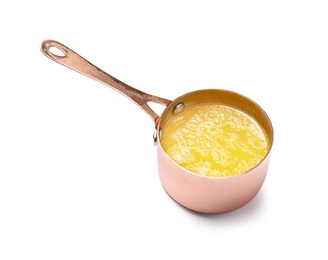 Saucepan with clarified butter on white background