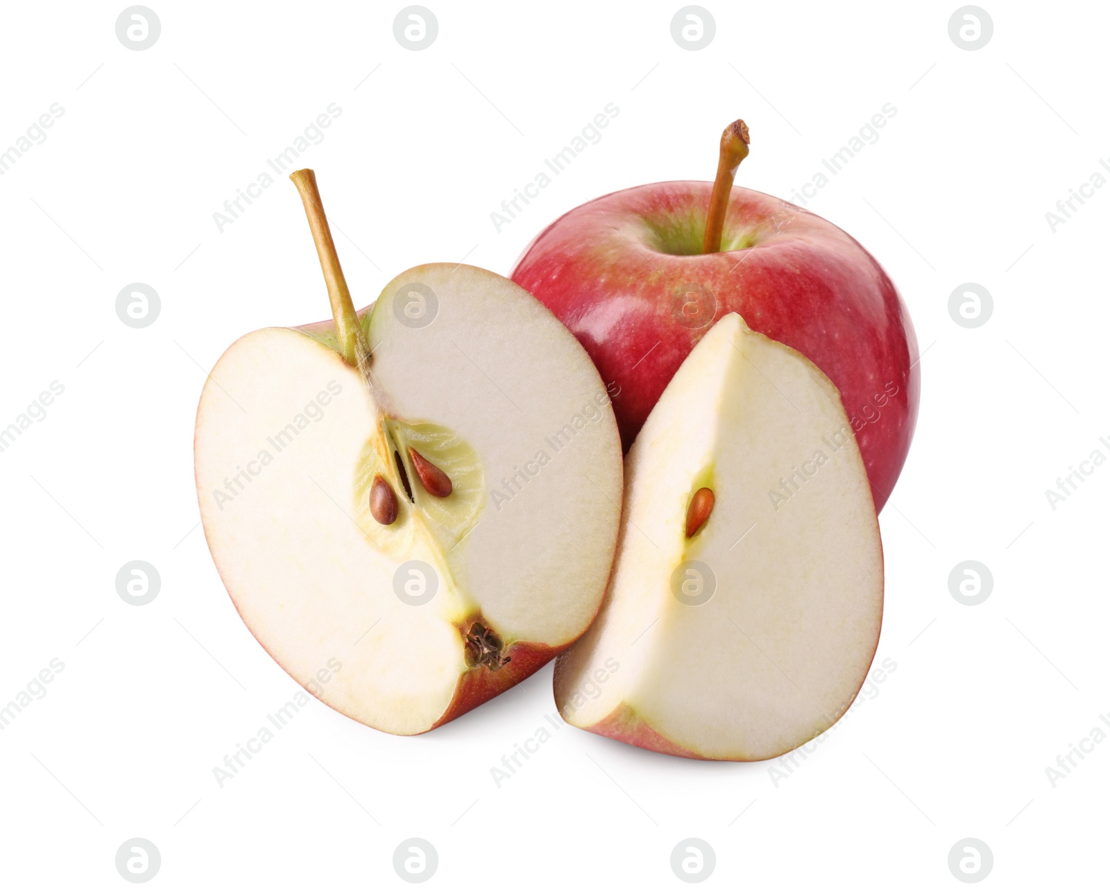 Photo of Whole and cut red apples isolated on white