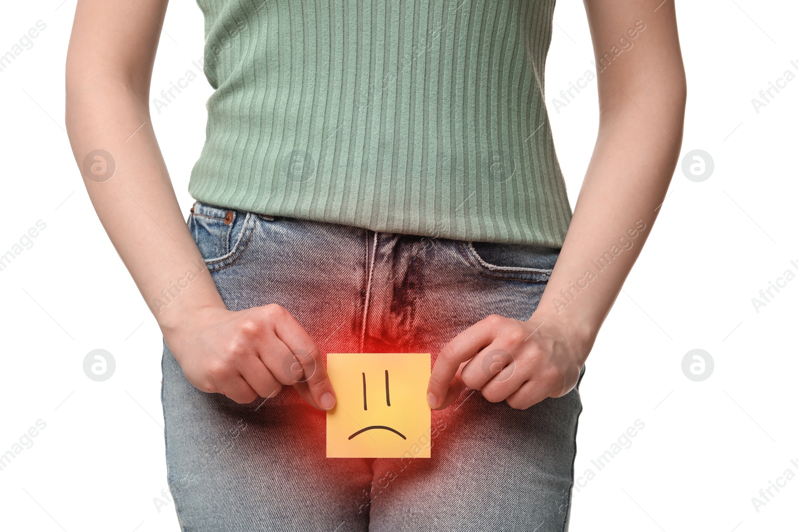 Image of Woman holding sticky note with drawn sad face and suffering from cystitis symptoms on white background, closeup