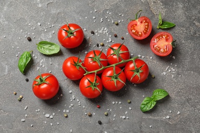 Photo of Flat lay composition with cherry tomatoes on stone background