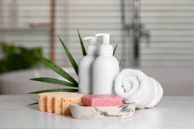 Photo of Composition with spa products on white marble table indoors