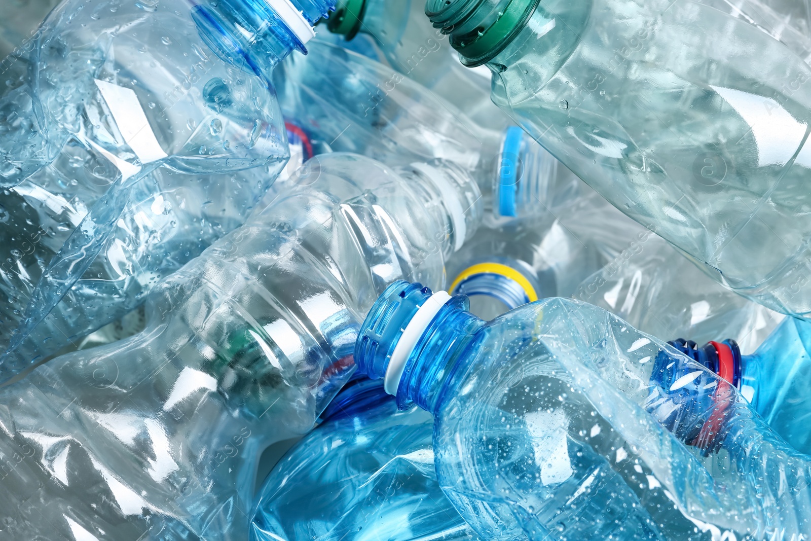 Photo of Many plastic bottles as background, closeup. Recycle concept