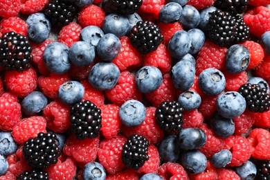 Photo of Raspberries, blackberries and blueberries as background