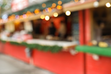 Blurred view of Christmas fair stall outdoors