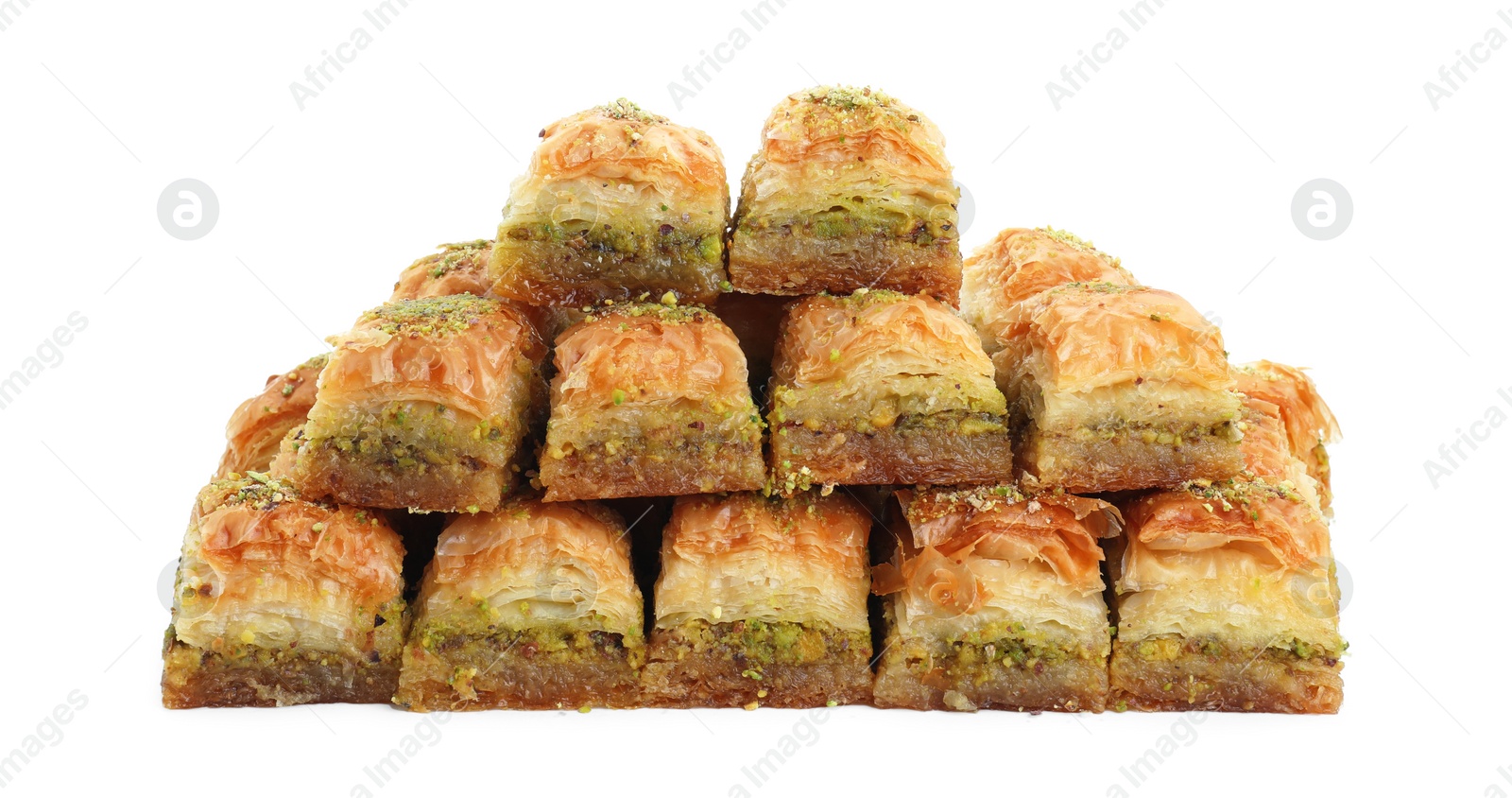 Photo of Delicious fresh baklava with chopped nuts isolated on white. Eastern sweets