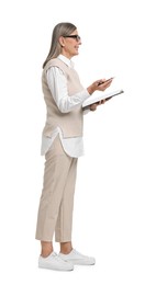 Senior woman with clipboard on white background