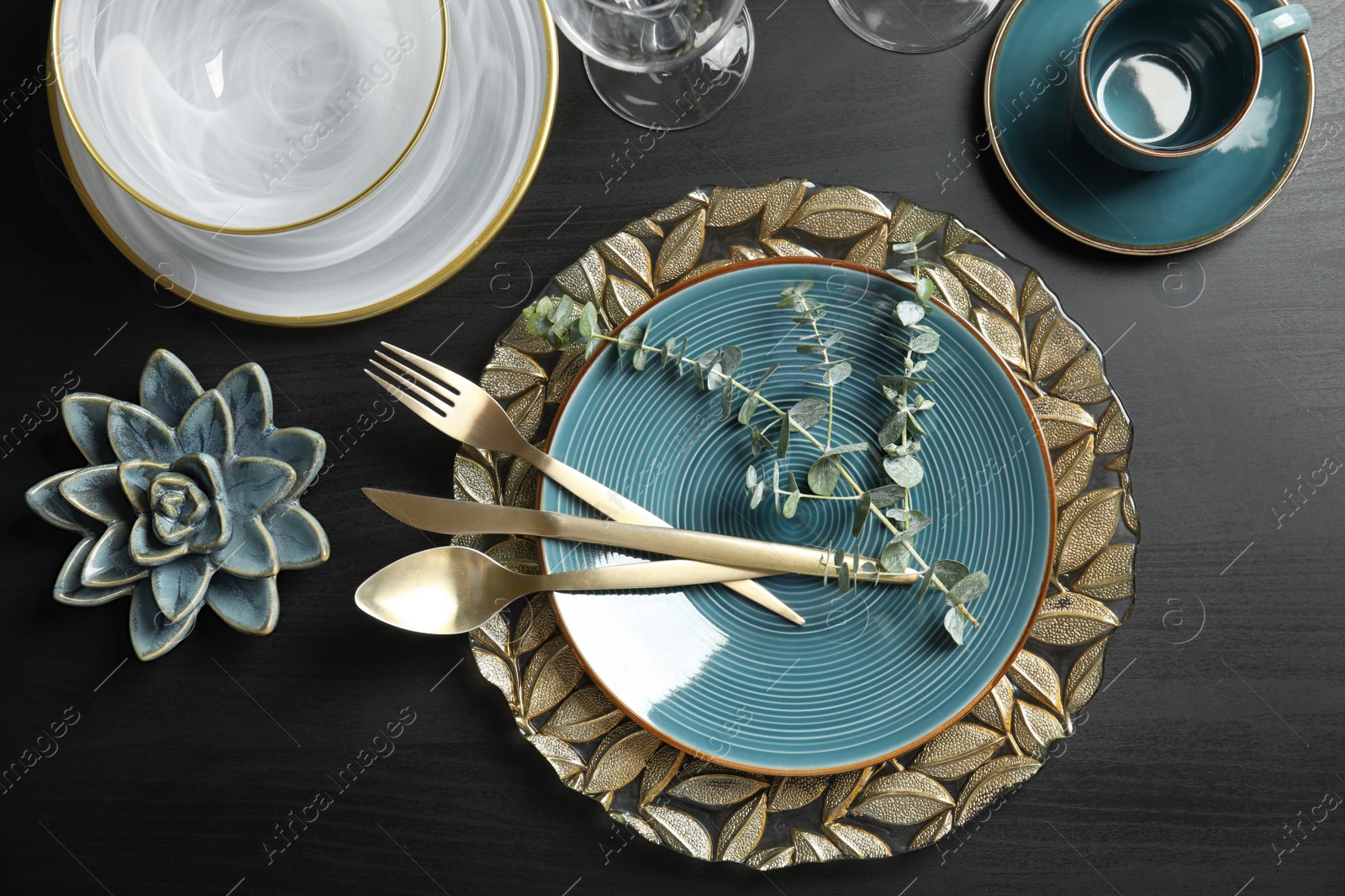 Photo of Elegant table setting on dark background, top view