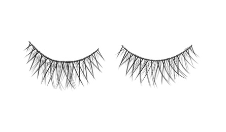 Photo of Beautiful pair of false eyelashes on white background, top view